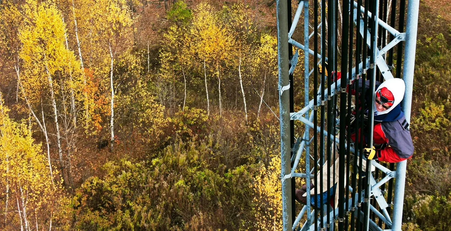 Climber on cell tower