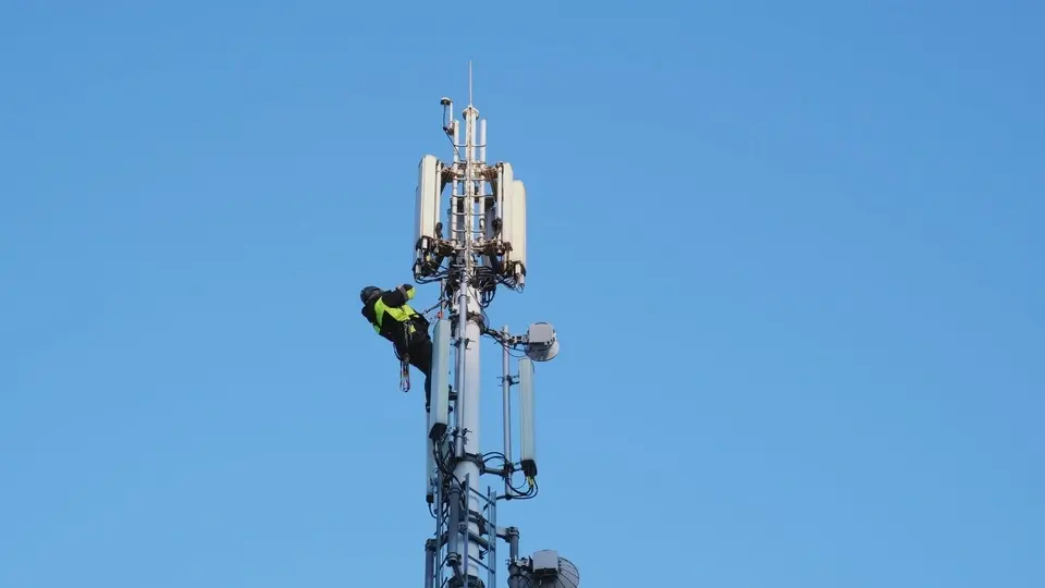 cell-tower-technician-at-height